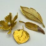 4 vintage Gold tone leaf brooches/pins Photo 0