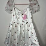 Dolls Kill White Mini Dress with Red Floral Accents Photo 0