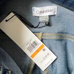 Calvin Klein Cropped Medium Wash Jean Jacket Photo 9