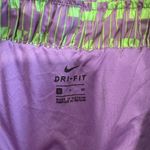 Nike Purple and Green Athletic Shorts with Curved Hem Photo 4