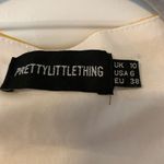 Pretty Little Thing  chiffon overlay mini dress.  Size: 6.  Lined. Photo 2