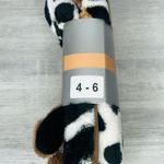 A little treat for your feet. Cow cozy fuzzy slippers size 4 Photo 3