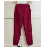 FIGS Women's Zamora Jogger Scrub Pants in Deep Cranberry, Size XXS Photo 1