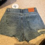 Princess Polly Blue Distressed Jean Shorts Photo 1