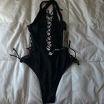 Black one piece with open sides Photo 3