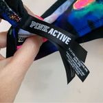 PINK - Victoria's Secret Victoria’s Secret PINK Spiral Tie-Dye Black/Pink Sports Bra Photo 1