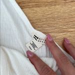 Billabong white / Cream ribbed cris-cross crop tank with Ruffled Sleeves medium Photo 1