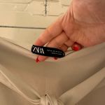 ZARA  tan mini skirt with bow size M Photo 2