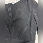 Saints + Secrets  Black Ruffle Romper in EUC size XS Photo 3