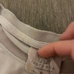 Ivory Ella  Cream Long Sleeve Shirt with Elephant Pocket Photo 1