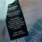 Le Superbe LUXURY White T Photo 1