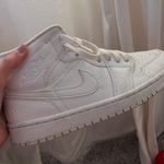 Air Jordan Women’s 1 Mid white snakeskin Photo 1