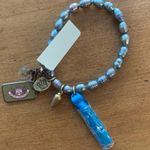 Juicy Couture Retro  Pam & Gela Silver Bracelet with Blue Tassel New with Tags Photo 2