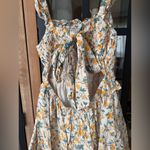 Tuckernuck Ella Blu eyelet floral smocked mini dress tiered ruffle sleeveless marigold Photo 4