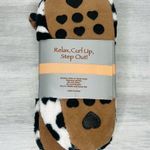 A little treat for your feet. Cow cozy fuzzy slippers size 4 Photo 4