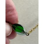 Vintage Mr. We 1970’s green glass gold tone long necklace. Photo 1