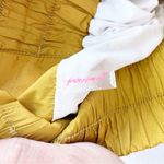 Free People  Movement The Way Home High Waisted Shorts in Gold Photo 6