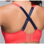 Lululemon  bright orange/navy blue sports‎ bra ( 32C ) Photo 1