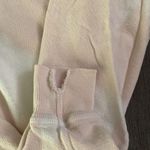 The Great EUC bleached out pale pink and white distressed sweatshirt. Photo 3
