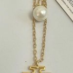 Tory Burch New  Britten Gold Tone Double Strand Layered, Logo with Pearl Charm Photo 3