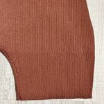 Story On Brown Romper  Photo 1