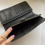 Coach  Black leather skinny wallet Photo 4