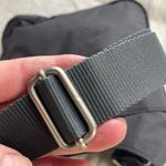 Baggallini  grey crossbody bag.  Many pockets Photo 2