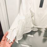 Chelsea28  ruffle front side tank. Photo 3