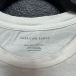 American Eagle  Outfitters White Tee with Graphic Design Size XS/S Photo 2