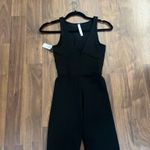 Babaton  the group NWT black biker short v neck workout jumpsuit onesie romper XS Photo 3