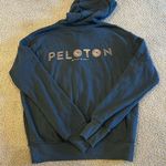 Spiritual Gangster Women’s Dark Grey Zip-up Hoodie with Rose Gold Peloton Font Photo 0