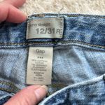 Gap  curvy straight jeans size 12/31R, has what looks like paint stain see photo Photo 1