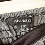 Rhapsody  Strapless Gray Bubble Hem Dress with Rosette Detail | Small Photo 2