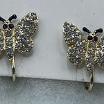 Vintage rhinestone encrusted butterfly earrings. Gold Photo 0
