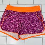 Nike Dri Fit Women's Athletic Running Shorts with pockets- Purple and Orange 292 Photo 0