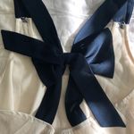 Mimi Chica Nordstrom White Flowy Top w/ Navy Back Bow Detail Photo 2