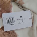 We Wore What NEW Women Size Medium Beige Cowhide Print V-Shape Leggings Photo 5