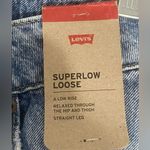 Levi's NWT  Superlow Loose Fit Straight Leg Jeans Distressed Light Wash 26 x 32 Photo 5