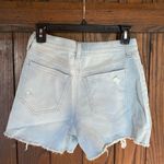 SO  size 0/24 women’s blue high rise ripped jeans Photo 1