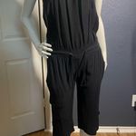 Urban behavior strapless jumpsuit capris black size medium pockets romper casual Photo 1