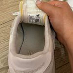 New Balance grey and white sneakers size women US 7.5 Photo 4