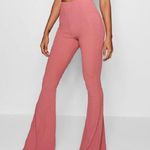 Urban Outfitters Pink flare bell button pants Photo 3