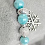 Hand Crafted Ice Blue and Sparkly Silver beaded Snowflake Charm Bracelet Photo 0