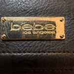 Bebe  Black Logo Embossed Faux Leather Wallet Photo 4