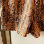 Haute Monde  Black and Orange Patterned pleather skort small Photo 11