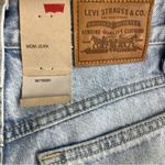 Levi's Levi’s Mom Jean Size 24 with distressed rip on one knee New With Tags Photo 3