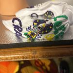 Headband absolutely gorgeous. It appears to be a Mardi Gras.​ Photo 7