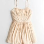 Hollister Orange Floral Romper Photo 1