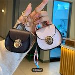 Elegant Mini Saddle Bag
Keychain with Premium Silk
Scarf Beige Grey Gray Photo 1