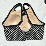 Kona Sol Medium Kona Sola black and white striped swim top. Photo 2